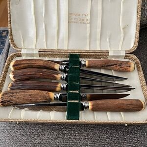 Antique stag handeled knives (Gimbel’s, made in England) in original case.